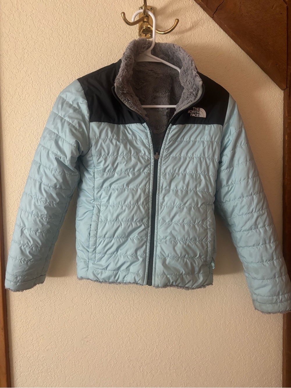 The North Face Light Blue Puffer Jacket with Black Yoke